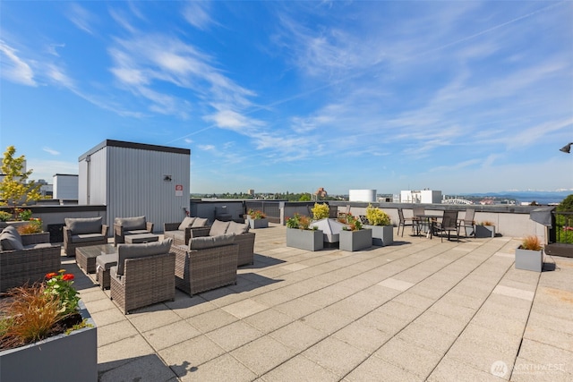 303 23rd Ave S Unit 308, Seattle, WA 98144 - view of patio featuring an outdoor living space