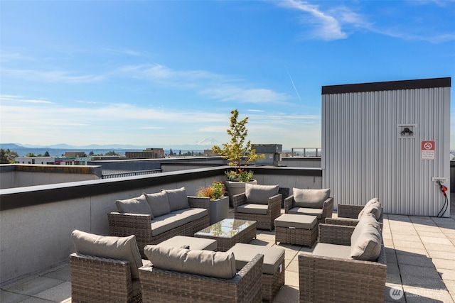 303 23rd Ave S Unit 308, Seattle, WA 98144 - view of patio / terrace featuring outdoor lounge area and a mountain view