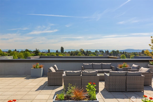 303 23rd Ave S Unit 308, Seattle, WA 98144 - view of patio featuring an outdoor living space