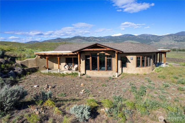 3B Johnny Haase Ln, Winthrop, WA 98862 - back of house with a mountain view and stucco siding
