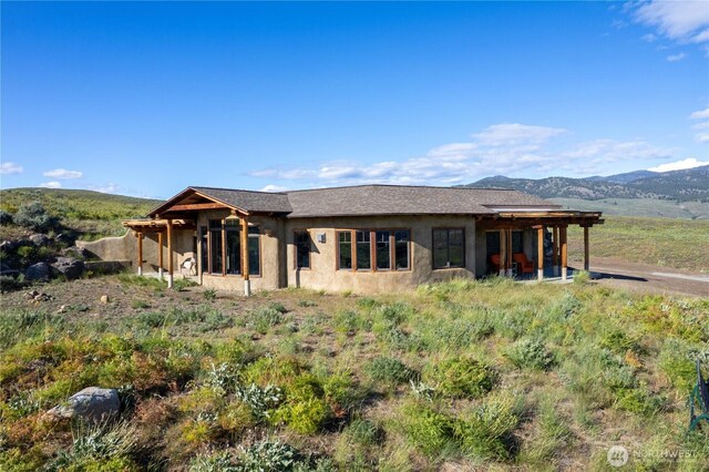 3B Johnny Haase Ln, Winthrop, WA 98862 - view of front facade with a mountain view and stucco siding