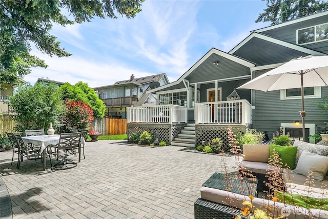 746 N 89th St, Seattle, WA 98103 - view of patio with a wooden deck, an outdoor living space, and outdoor dining space