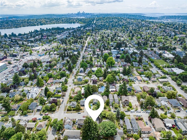 746 N 89th St, Seattle, WA 98103 - aerial view of property and surrounding area featuring a large body of water and nearby suburban area