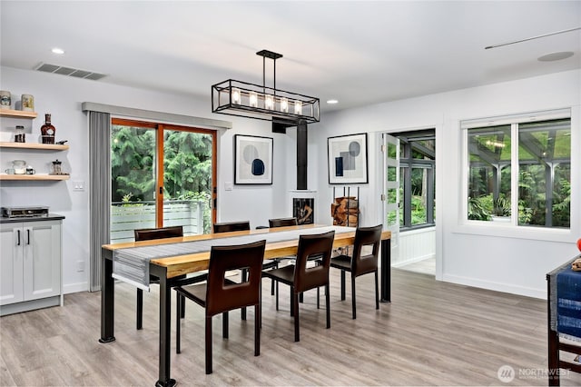 30 Hemlock Ct, Port Townsend, WA 98368 - dining area with light wood-style flooring, recessed lighting, and a chandelier