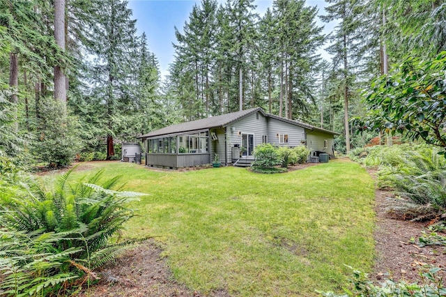 30 Hemlock Ct, Port Townsend, WA 98368 - view of front of property featuring a sunroom and a front yard
