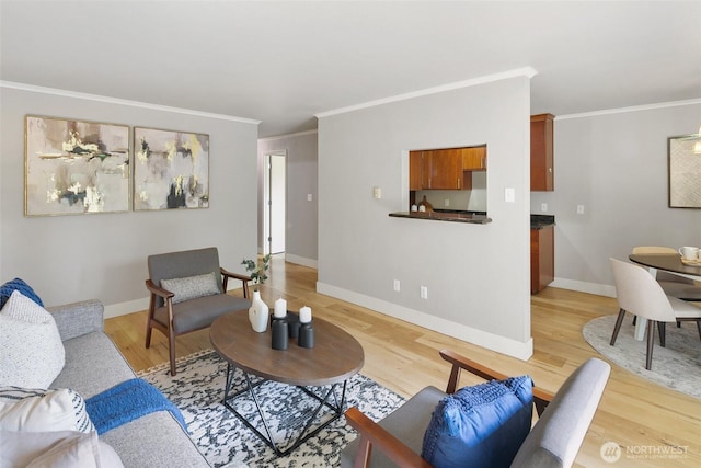1016 6th Ave N Unit 102, Seattle, WA 98109 - living area with crown molding, light wood-type flooring, and baseboards