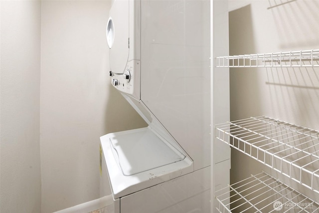 1016 6th Ave N Unit 102, Seattle, WA 98109 - laundry room featuring estacked washer and dryer