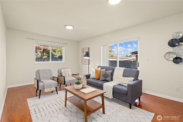 12408 1st Ave SW, Seattle, WA 98146 - living room featuring baseboards and light wood finished floors