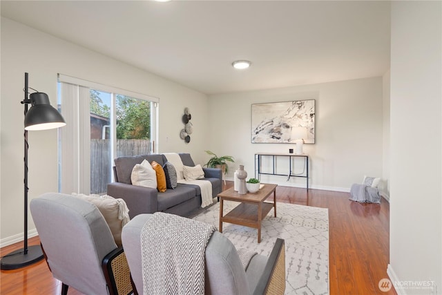 12408 1st Ave SW, Seattle, WA 98146 - living area featuring baseboards, wood finished floors, and recessed lighting
