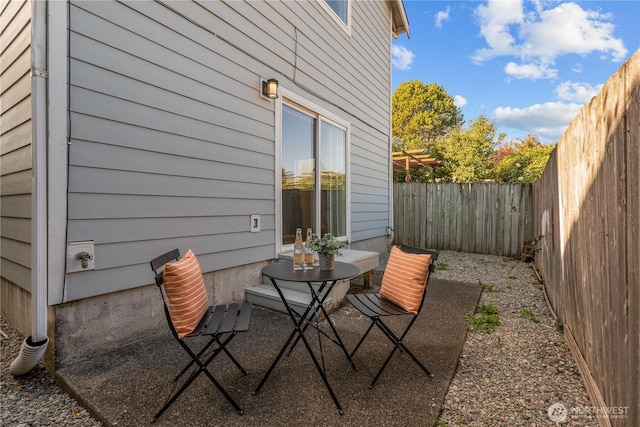 12408 1st Ave SW, Seattle, WA 98146 - fenced backyard featuring a patio area