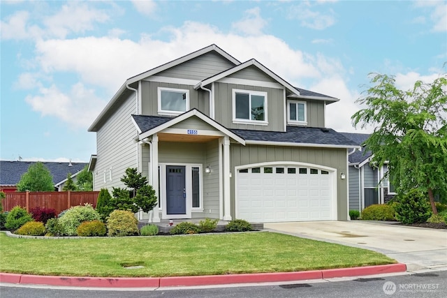 4155 Autumn Way, Mount Vernon, WA 98273 - view of front of house with board and batten siding, concrete driveway, a garage, and roof with shingles
