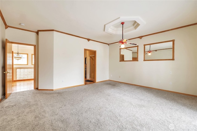 31637 107th Ave SE, Auburn, WA 98092 - carpeted spare room with ornamental molding, a ceiling fan, baseboards, a smoke detector, and a chandelier