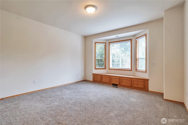 31637 107th Ave SE, Auburn, WA 98092 - spare room featuring light carpet and baseboards