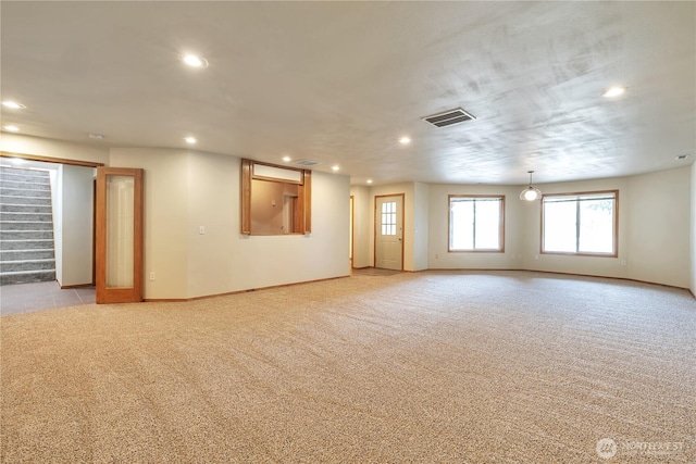 31637 107th Ave SE, Auburn, WA 98092 - empty room featuring recessed lighting, light carpet, baseboards, and stairs