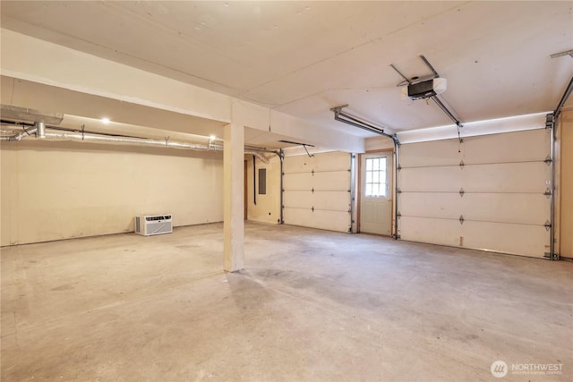 31637 107th Ave SE, Auburn, WA 98092 - garage featuring a garage door opener and heating unit