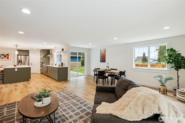 3598 Breeze Way NW, Bremerton, WA 98312 - living room featuring plenty of natural light, light wood-style floors, recessed lighting, and baseboards