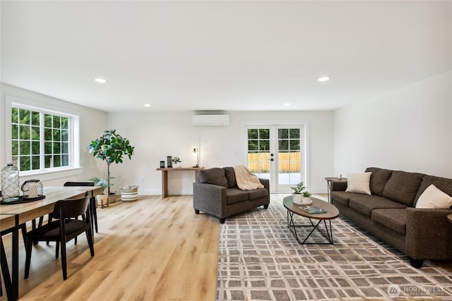 3598 Breeze Way NW, Bremerton, WA 98312 - living area with a wall mounted AC, light wood finished floors, recessed lighting, and french doors