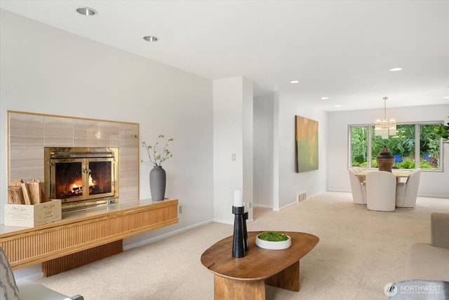 4102 205th Ave SE, Sammamish, WA 98075 - living room with carpet floors, recessed lighting, a fireplace, and a chandelier