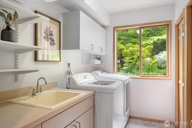 4102 205th Ave SE, Sammamish, WA 98075 - washroom featuring cabinet space and washer and clothes dryer