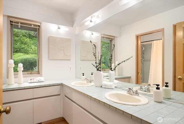 4102 205th Ave SE, Sammamish, WA 98075 - full bathroom with double vanity, plenty of natural light, and curtained shower