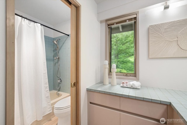 4102 205th Ave SE, Sammamish, WA 98075 - bathroom featuring shower / bath combo with shower curtain and wood finished floors
