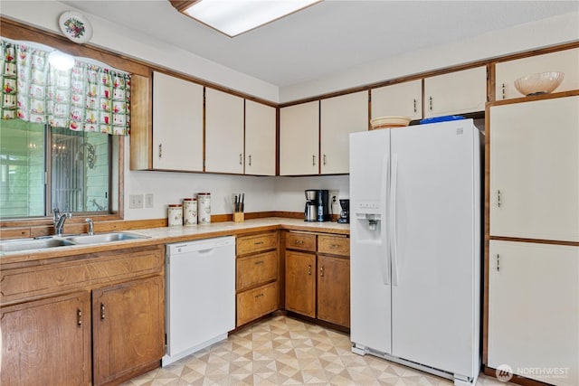 2412 Mulberry St, Longview, WA 98632 - kitchen featuring white appliances, a sink, light countertops, and light flooring