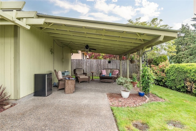 2412 Mulberry St, Longview, WA 98632 - view of patio with outdoor lounge area, ceiling fan, and an attached carport