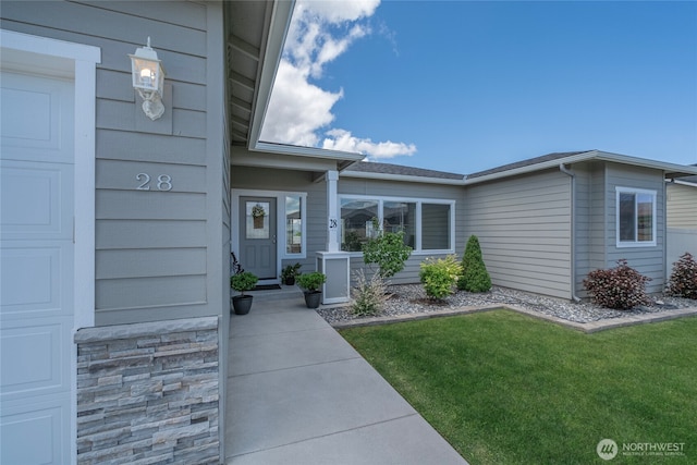 28 S Millbrook, East Wenatchee, WA 98802 - view of exterior entry featuring a lawn