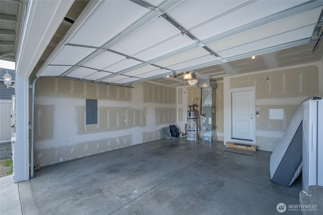 28 S Millbrook, East Wenatchee, WA 98802 - garage featuring electric panel, a garage door opener, water heater, and heating unit