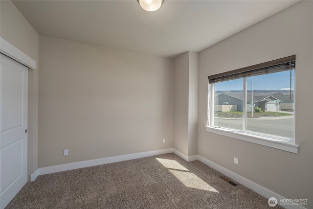 28 S Millbrook, East Wenatchee, WA 98802 - spare room featuring carpet and baseboards