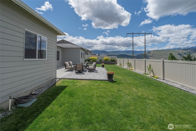 28 S Millbrook, East Wenatchee, WA 98802 - view of yard with a mountain view and a patio