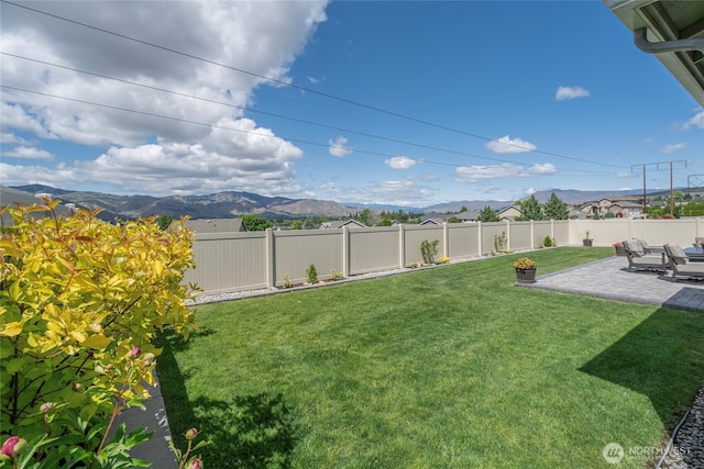 28 S Millbrook, East Wenatchee, WA 98802 - view of yard featuring a patio and a mountain view