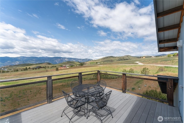 645 Chelan Trails Rd, Chelan, WA 98816 - wooden terrace with a view of rural / pastoral area, a mountain view, and outdoor dining area