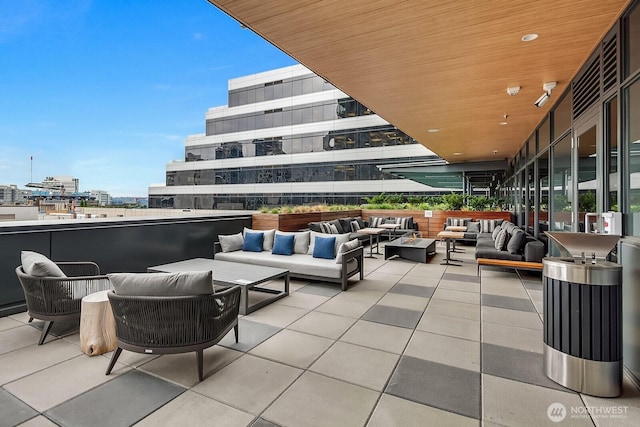 1808 Minor Ave Unit 912, Seattle, WA 98101 - view of patio / terrace featuring an outdoor living space and a city view