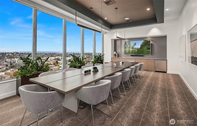 1808 Minor Ave Unit 912, Seattle, WA 98101 - dining area featuring a raised ceiling and baseboards
