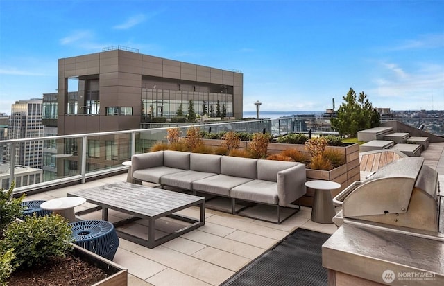 1808 Minor Ave Unit 912, Seattle, WA 98101 - view of patio / terrace featuring an outdoor hangout area and a view of city