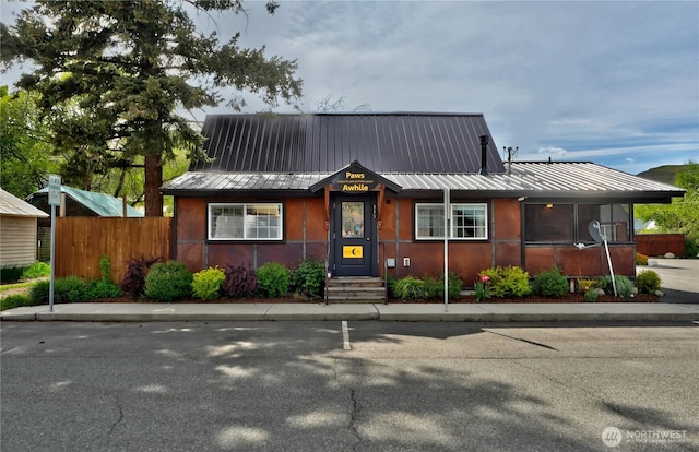 115 Johnson St N Unit 1, 2, 3, Twisp, WA 98856 - view of front of property featuring fence and metal roof
