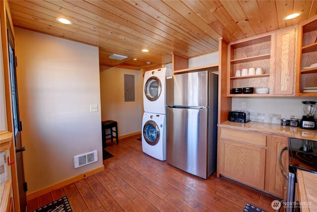 115 Johnson St N Unit 1, 2, 3, Twisp, WA 98856 - kitchen featuring freestanding refrigerator, estacked washer and dryer, electric panel, open shelves, and wood ceiling