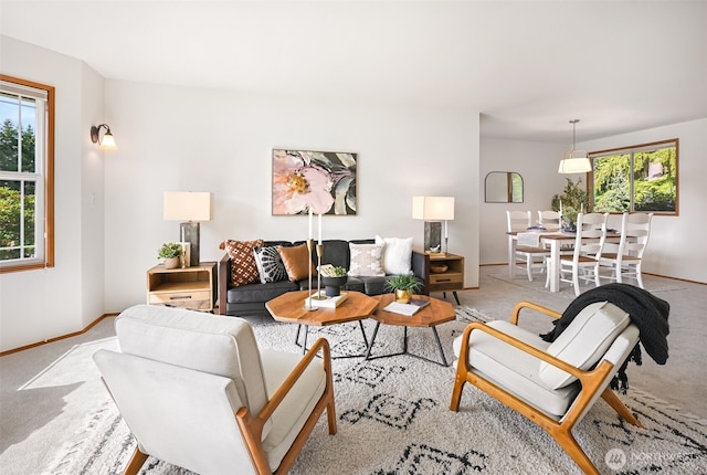 14431 Cascade Dr SE, Snohomish, WA 98296 - living room with healthy amount of natural light, baseboards, and light carpet