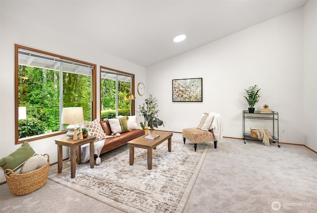 14431 Cascade Dr SE, Snohomish, WA 98296 - carpeted living area featuring lofted ceiling, baseboards, and recessed lighting