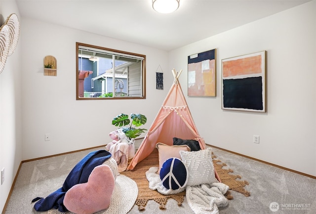 14431 Cascade Dr SE, Snohomish, WA 98296 - rec room with carpet floors and baseboards
