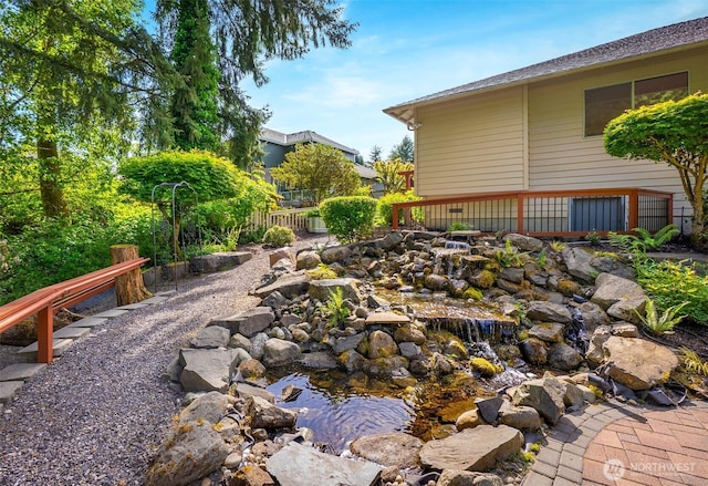 14431 Cascade Dr SE, Snohomish, WA 98296 - view of yard with a garden pond