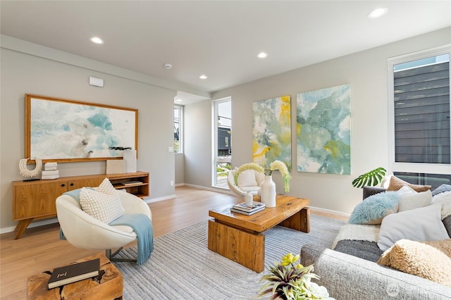 1801 NW 65th St Unit C, Seattle, WA 98117 - living room featuring wood finished floors, baseboards, and recessed lighting