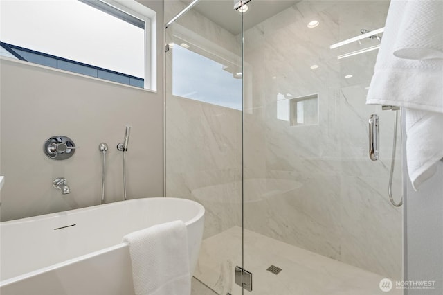1801 NW 65th St Unit C, Seattle, WA 98117 - full bathroom with a stall shower and a freestanding bath