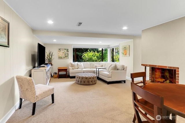 living room featuring carpet flooring, recessed lighting, and baseboards
