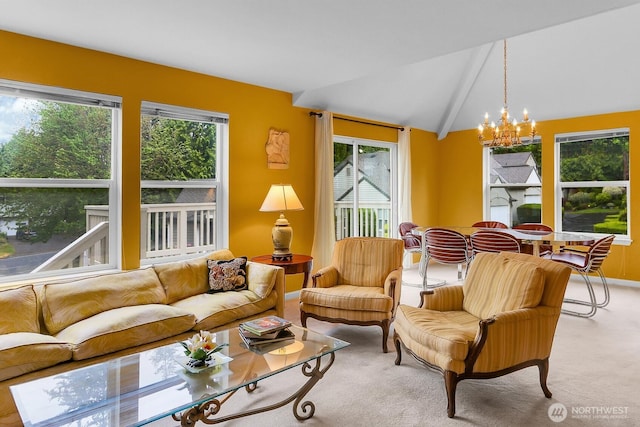 carpeted living room with healthy amount of natural light, a chandelier, and lofted ceiling