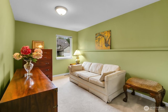 living room with light colored carpet and baseboards