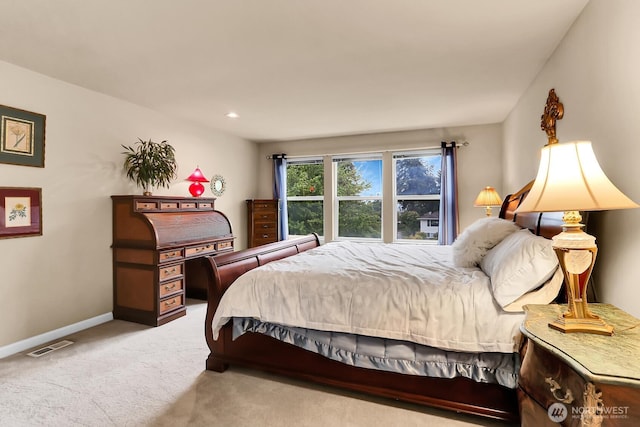 bedroom featuring carpet floors and baseboards