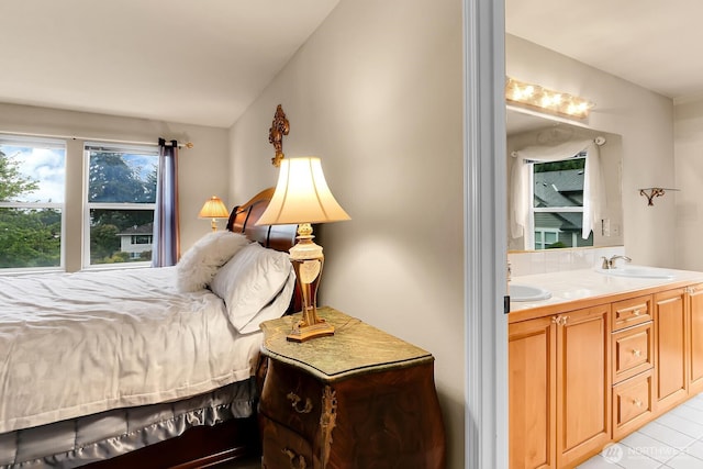 bedroom featuring a sink