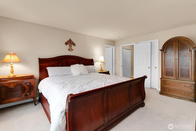 bedroom with light carpet